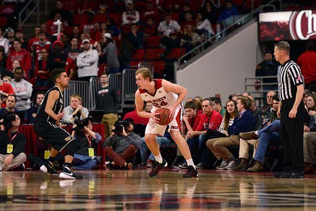 Freshman forward Maverick Rowen takes on Sophmore guard Mitchell Wilbekin for a chance at some points. The Wolfpack played a home game at PNC Arene this Saturday, Feb. 13, against the Wake Forest Deacons.