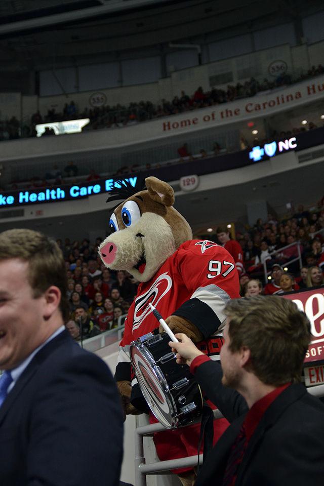 Stormy the Ice Hog, the Carolina Hurricanes Mascot plays a drum during the third period of the ice hockey game versus the Pittsburgh Penguins Friday, Feb 12, 2016.