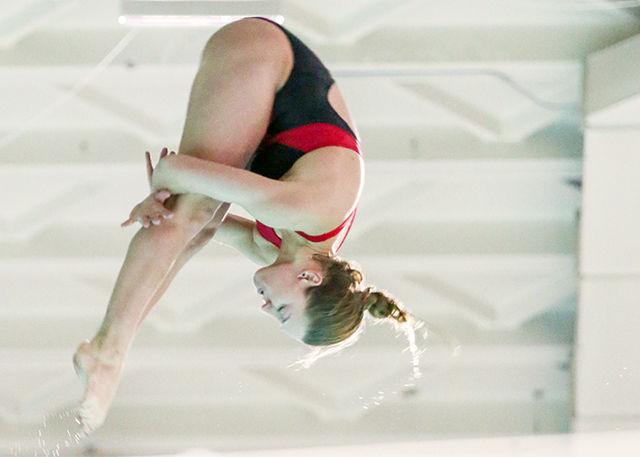 Redshirt Junior Rachel Mumma dives during the meet against UNC on Saturday. Mumma placed first in Women's 1M diving with a 332.32. Overall, the Women lost to #5 UNC 134.5-146.5.