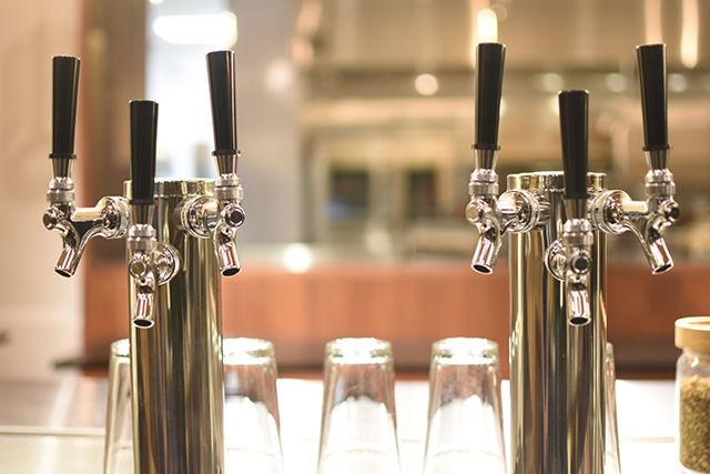 Taps stand on call at Jubala Coffee on Hillsborough Street Wednesday. Jubala Coffee opened Friday and features locally roasted Counter Culture Coffee for its customers. Jubala Coffee will soon be serving Trophy Beer at its Hillsborough Street location.