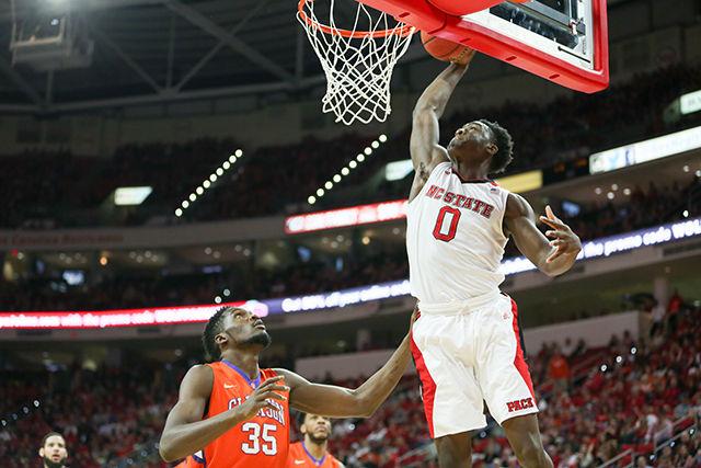 Abu throws down a dunk during the Clemson vs NC State basketball game at PNC Arena on February 20, 2016.
