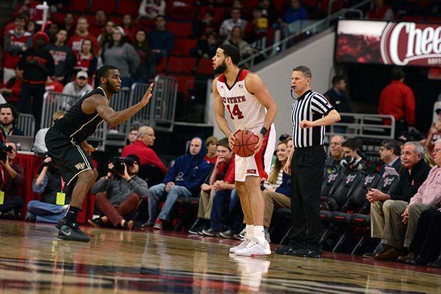 Sophmore forward Caleb Martin takes on senior guard Codi Miller-Mcintyre, of Wake Forest for a chance at a shot or a teammate. The game this past Saturday, Feb. 13, 2016 at PNC Arena had a final score of 99-88, NC State.