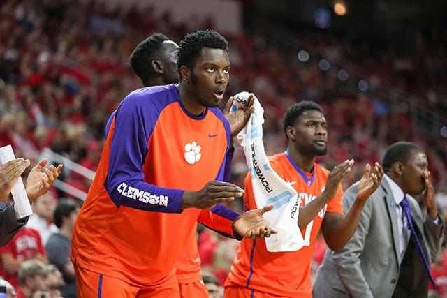 The Clemson bench claps during the Clemson vs NC State basketball game at PNC Arena on February 20, 2016.