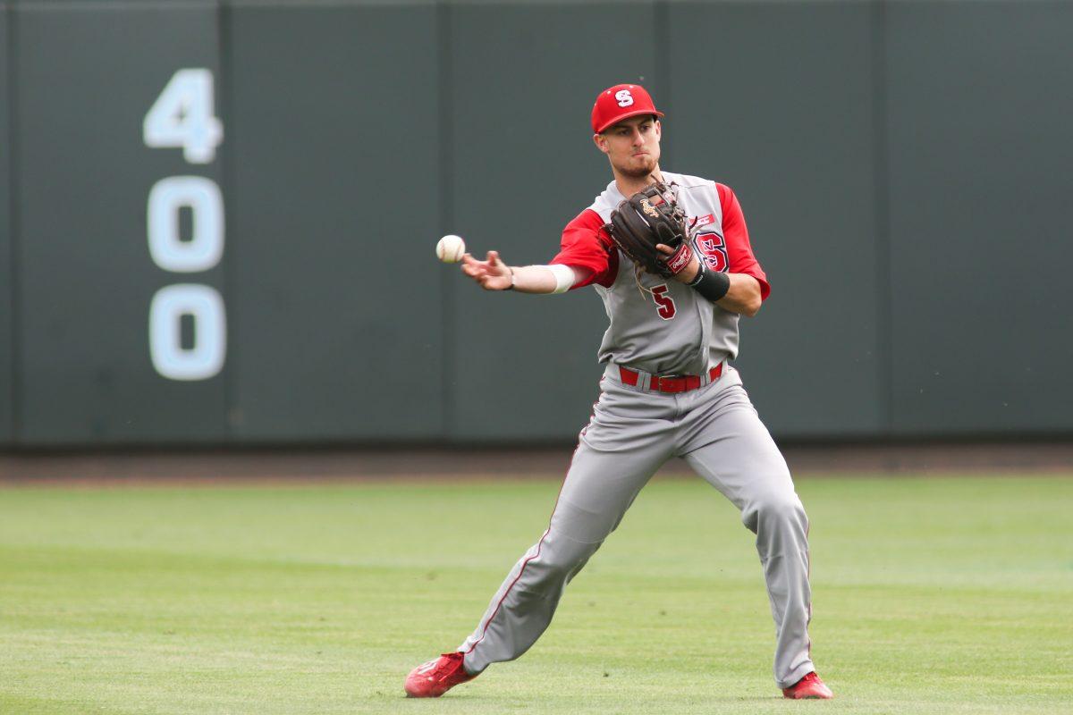 Senior shortstop Joel McKeithan fields a ball during the final game of a triple header against UNC. McKeithan had one hit, one run and one runner batted in during the 6-3 win April 12 in Boshamer Stadium.