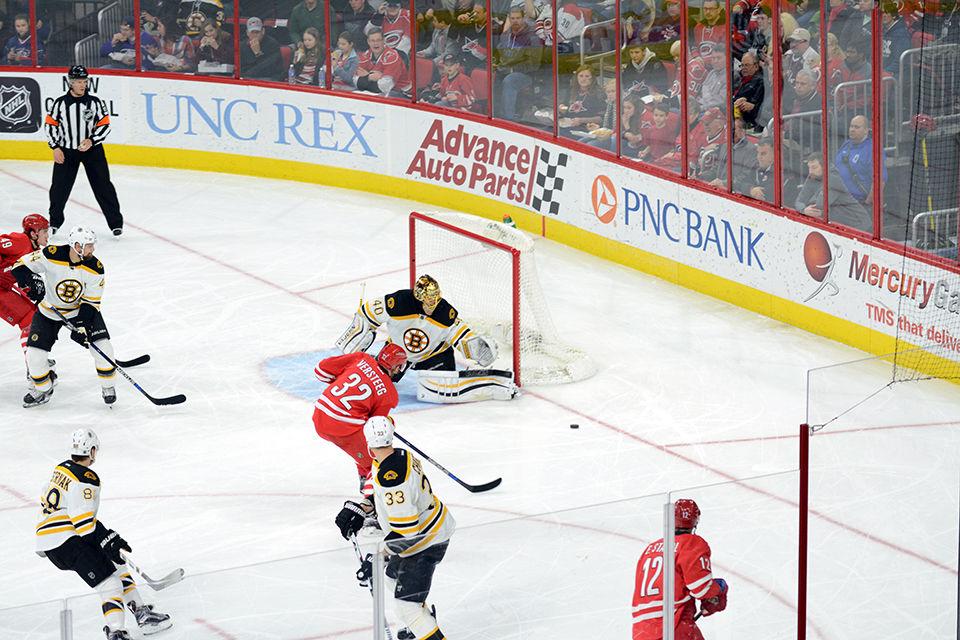 Boston Bruins goalie Tuukka Rask blocks a shot by Carolina Hurricanes right forward Kris Versteeg during the second period of the game on Friday, Feb 26, 2016.