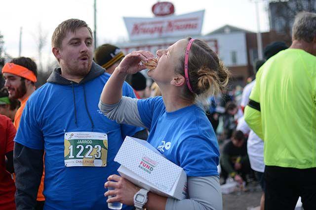 Katy Covard from Atlanta, GA devours her doughnuts outside of the Krispy Kreme store on Feb. 6 2016. This was Covard's first time participating in the Krispy Kreme Challenge.