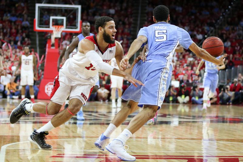 Sophomore guard/forward Cody Martin loses the ball in the first half to UNC guard Marcus Paige. Cody Martin had zero points, three rebounds, one assist, one block, and three steals. The NC State Wolfpack lost to the UNC Tarheels 80-68 at PNC Arena on February 24, 2016.