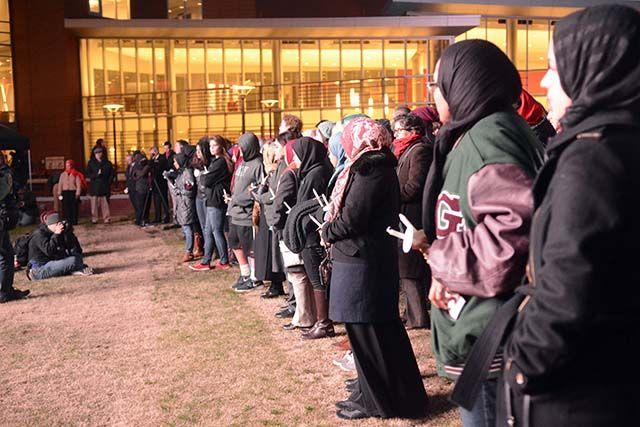 A group of students gather around Standford Commons for a candlelight vigil on Feb. 10th, 2016. The vigil marked the one year anneversiry of the Our Three Winner's shooting.
