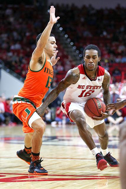 Junior point guard Cat Barber drives toward the rim in the second half. Barber played all 40 minutes while scoring 30 points, shooting 10 for 10 from the free-throw line, 10 of 18 on the court and racking up three rebounds and four assists. The Wolfpack beat the Miami Hurricanes 85-69 Saturday at PNC Arena