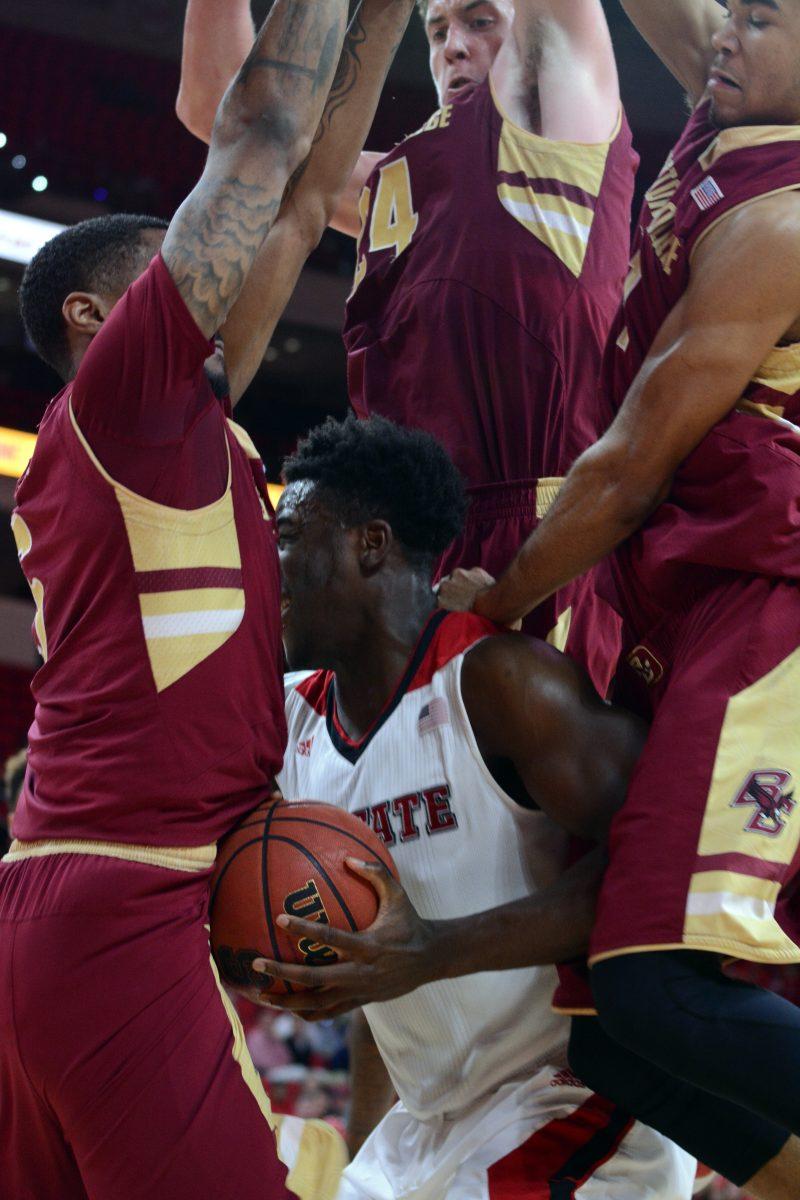Three Boston College basketball team members block sophomore forward Abdul-Malik Abu's opportunity to shoot during the second half of the basketball game at PNC Arena on Wednesday, March 2, 2016.