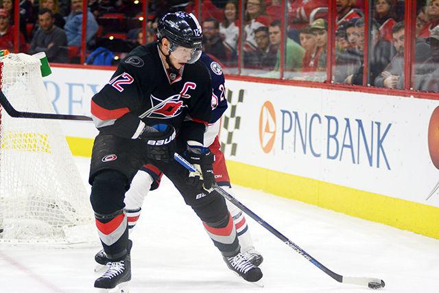 Carolina Hurricanes captain Eric Staal regains control of the puck against Columbus Blue Jackets defenseman Ryan Murray. E. Staal earned one point in Friday's game at PNC Arena with an assist to Elias Lindholm's empy-net goal. The Hurricanes beat the Blue Jackets 4 to 1.
