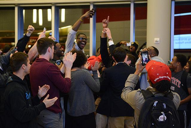 Students celebrate after Paul Nolan and Brayndon Stafford win the runoff election Thursday night in Talley Pavillion.