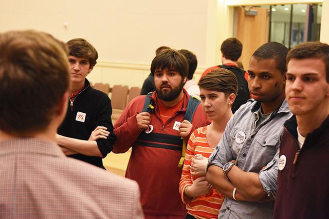 Gavin Harrison, chair of election and a senior in biological sciences, talks to candiates after announcing that the election for student body president and student body vice president has resulted in a run off on Tuesday. Long and Stafford will face off in a run-off and the results will be delieverd on thursday.