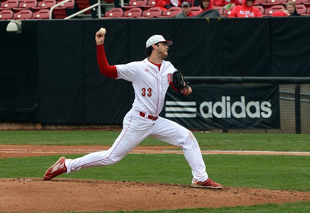 Johnny Piedmonte, a junior pitcher from Davidson, North Carolina, strikes out a Notre Dame batter with one of the many pitches he threw at the NC State Baseball game vs. Notre Dame at Doak Field on Sunday. The Pack won the game 16-6, with Piedmonte pitching two total innnings and only letting two Notre Dame batters walk during the course of the game.