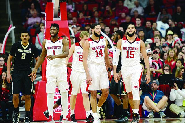 Lennard Freeman, Maverick Rowen, and twins Caleb and Cody Martin regroup after a free throw attempt. NC State Played a close game against Wake Forest this Saturday, Feb. 13, at PNC Arena.