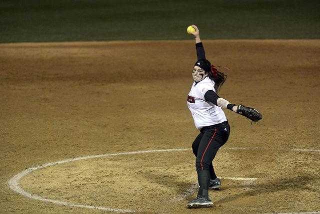 Sophomore Harli Hubbard, pitcher, winds up to pitch to a member of the opposing team. NC State's softball team played against UNC Charlotte on March 2nd at Dail Softball Stadium. NC State won the game 6-5.