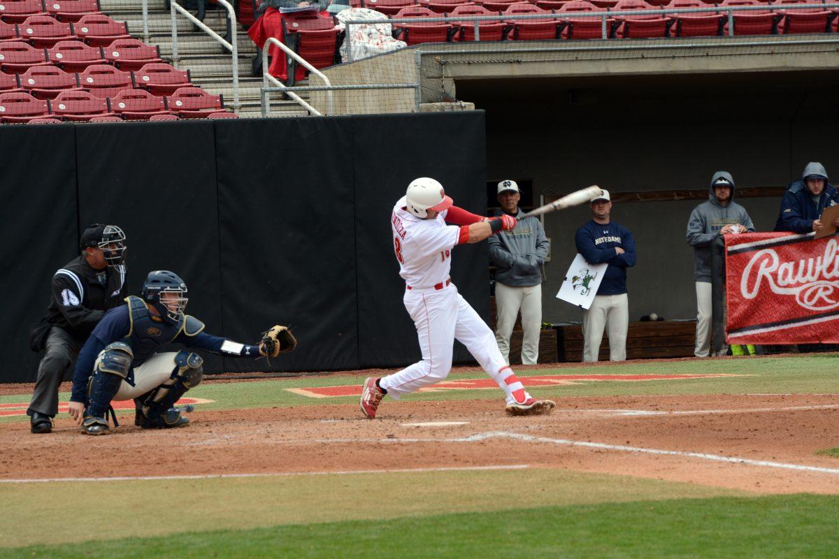 Evan Mendoza, a sophomore infielder from Sarasota, F.L., makes contact with a ball at the NC State baseball game v. Notre Dame at Doak Field on Sunday, March 20th. Mendoza had a batting average of .354 at the game, but one error when playing in the field for the Wolfpack. NC State won the game 16-6, and will spend a stretch of time playing away games before returning to Doak field on April 6th to play UNC Charlotte.