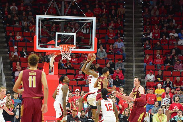 Shaun Kirk, a freshman guard, rebounds a ball during the first half of the game against Boston College Wednesday night, Mar 2, 2016. At the half, State trails Boston College 35 to 31 in PNC Arena.