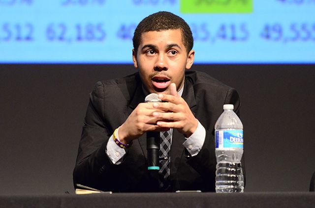 Darryl Johnson, a junior studying mechanical engineering and representative of Student Government, speaks during the Racial Climate Town Hall meeting hosted by Student Government in Stewart Theatre on January 13. Students discussed both the problems and possible solutions toward the racial climate on NC State's campus.
