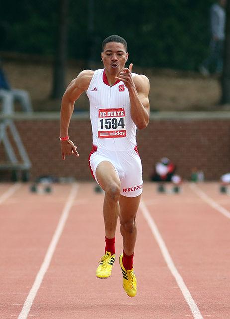 Sophomore sprinter Quashawn Cunningham edges by his competitors to take the win in the 100-meter dash during the 2016 Raleigh Relays at Derr Track on March 26. Cunningham won the event with a final time of 10.38 seconds, .05 seconds ahead of the second place finisher.