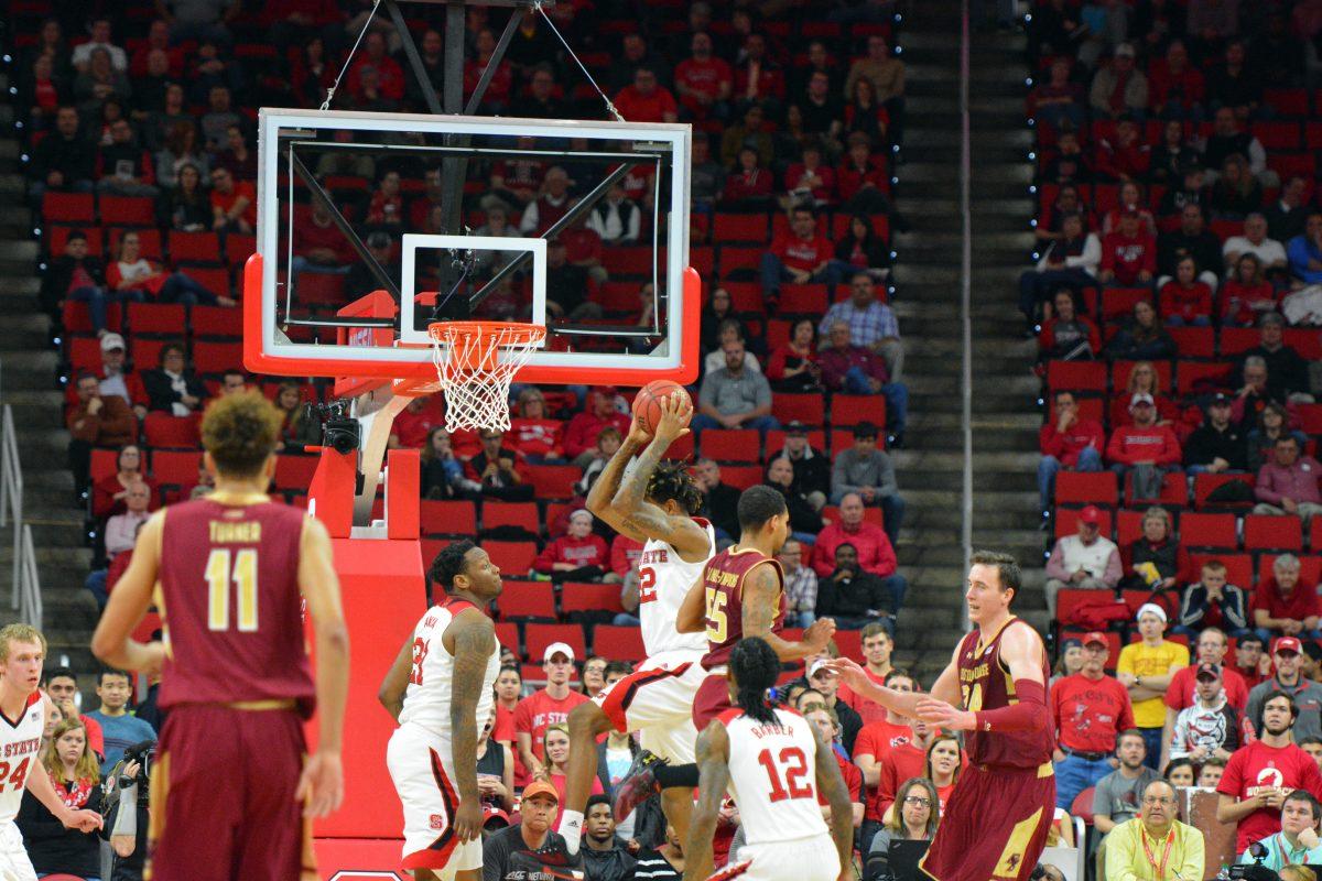 Shaun Kirk, a freshman guard, rebounds a ball during the first half of the game against Boston College Wednesday night, Mar 2, 2016. At the half, State trails Boston College 35 to 31 in PNC Arena.