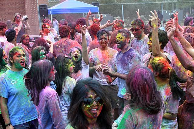 Students gather around and dance to Indian music during Holi. Holi is an Indian festival of colors and the event was cohosted by Maitri, Ektaa, UAB, and Kappa Phi Lambda. It took place on March 19, 2016 on Lee Field.