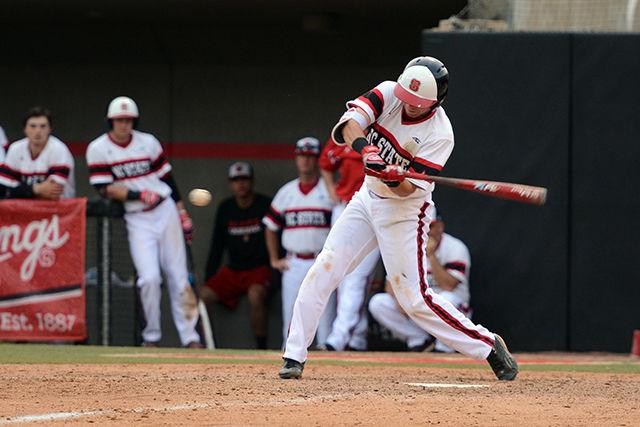 Sophomore infielder Stephen Pitarra swings and hits the ball toward first, only to be caught for an out. Pitarra was at bat five times during the game and made three hits, bringing in two runs. The NC State baseball team lost to Indiana State 11-7 at Doak field at Dail Park March 16.