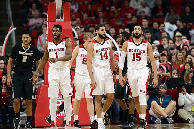 Lennard Freeman (left), Maverick Rowen (center), and twins Caleb and Cody Martin (right) regroup after a free throw attempt. NC State Played a close game against Wake Forest Feb. 13, at PNC Arena.