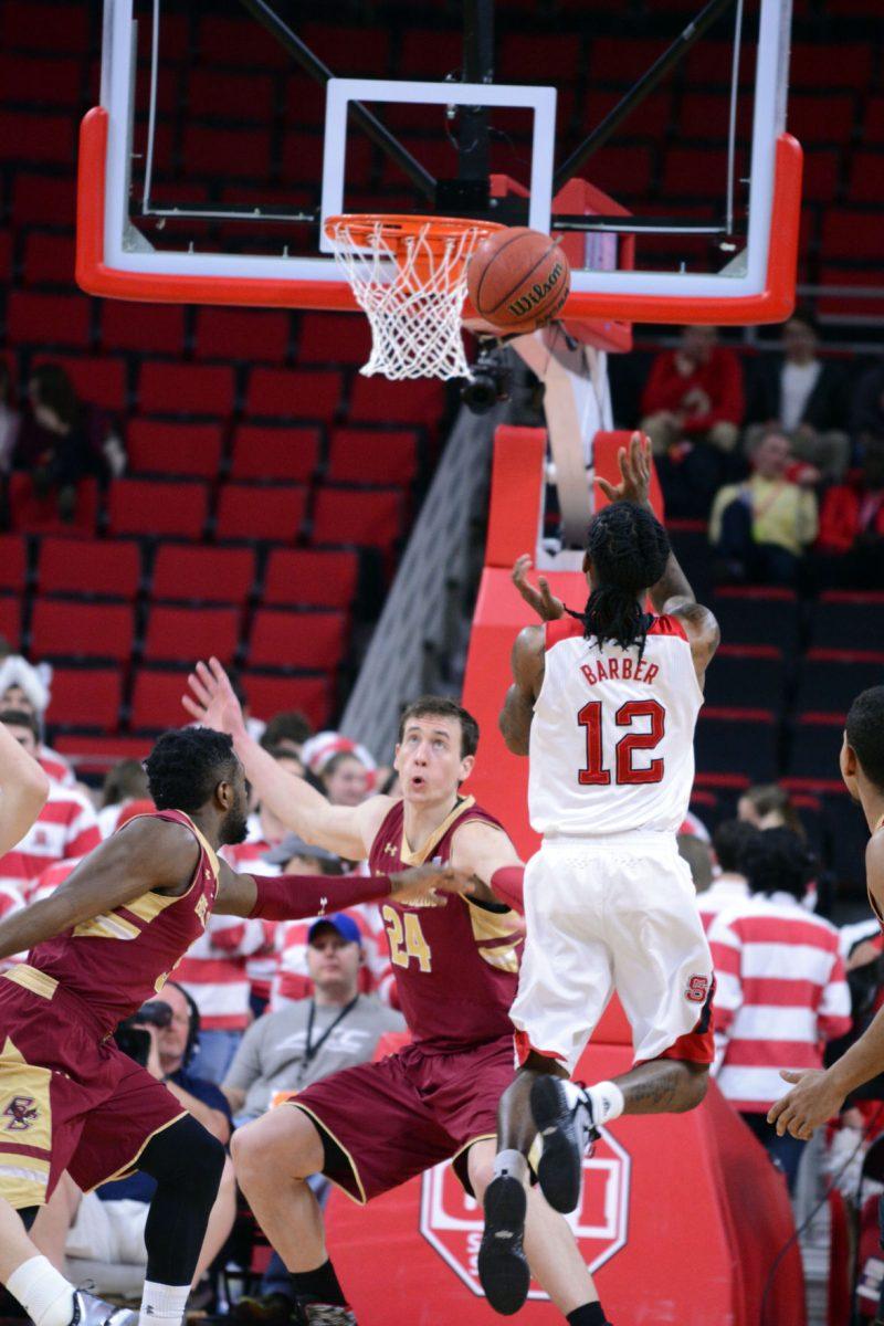 Junior guard Anthony "Cat" Barber attempts to score at the beginning of the first half of the basketball game against Boston College at PNC Arena on Wednesday, March 2, 2016. Abdul-Malik rebounds and dunks the ball for the first two points in the first 11 seconds.
