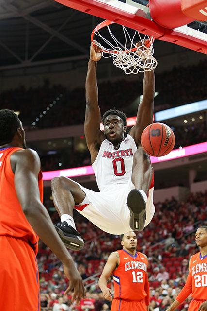 Sophomore Forward Abdul-Malik Abu throws it down with two hands for a flashy two points in the first half. Abu had a monster game with 17 points, 16 rebounds, one assist and three blocks in 33 minutes. The NC State Wolfpack beat the Clemson Tigers in a close one, 77-74, at PNC Arena Feb. 20.