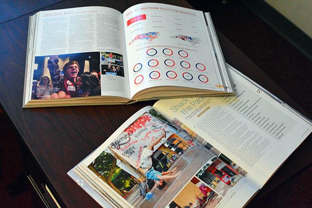 PHOTO ILLUSTRATION The 2013-2014 and 2014-2015 editions of the Agromeck, N.C. State's Official Yearbook, lies on a desk in their office in Witherspoon 318 on March 14, 2016. The 2014-2015 edition received a Gold Crown Award from Columbia Scholastic Press Association on March 13th.