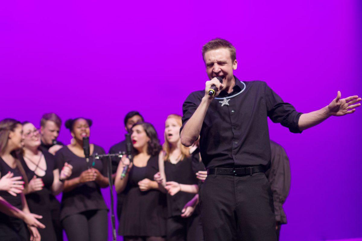 Colbey Robinson, a freshman in the college of engineering, belts a solo during Acappology's Spring Concert on March 30, 2016. The concert, called "Writing is Hard: Stories through Song", was held at Stewart Theater and featured performances of twelve songs arranged by the group and an honoring of the group's graduating seniors.