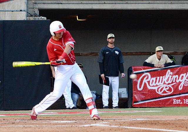 Sophomore infielder Evan Mendoza tips off a foul ball. Mendoza was at bat four times during the game, collecting one hit and one run. The NC State baseball team beat Wake Forest 6-1 at Doak Field at Dail Park April 11.