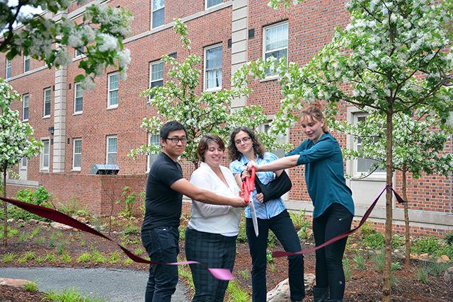 Roy Zhen, a graduate student studying landscape architecture, Elizabeth Moss, a graduate student studying landscape architecture, Tereza Faltysova, a senior and exchange student from Czech Technical University in Prague, Czech Republic studying architecture and Stormie Valentine, a senior studying horticultural science cut the ribbon at the Owen's Refuge ribbon-cutting ceremony between Owen and Turlington Halls Friday, April 22 2016. ''It was fantastic. Not only the experience itself in the profesional meaning but I have also met amazing people thanks to it. I will never forget it. Design College has became my new family and I'll miss all of them a lot. It changed my life" Faltysova said.