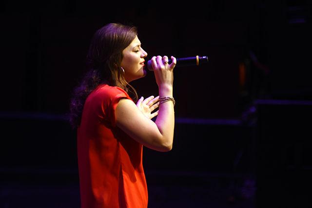 Anna Dengler, a freshman studying exploratory studies, leads the solo for &#8220;Send My Love&#8221; by Adele during the Ladies in Red spring concert April 6, 2016.&#160;