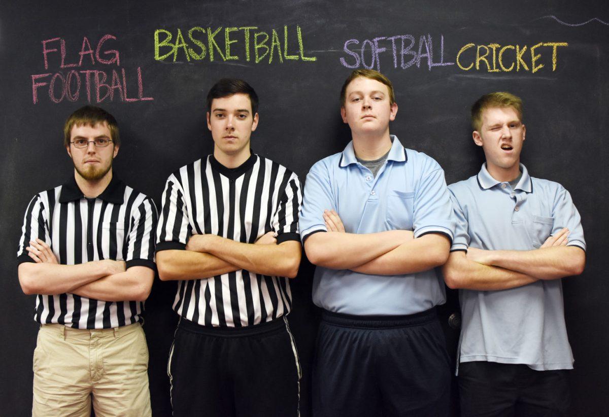 Brendan Lyles, a senior studying criminology and political science, Jason Vernot, a sophomore studying business administration, Andrew Casey, a freshman studying chemical engineering, and Nathaniel Monteleone, a sophomore studying mathematics, pose for a photo because they were chosen as the intramural referees of the week in their respective sports.