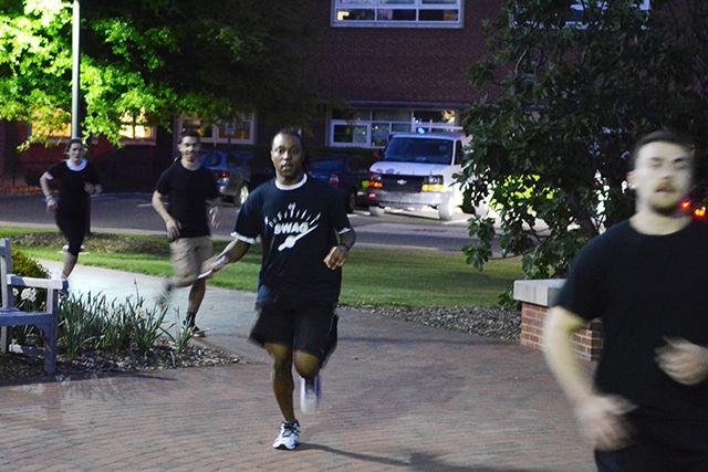 Jordan Drake, a sophomore studying parks, recreation and tourism management, runs into one of the checkpoints during Survive Raleigh Saturday night. Survive Raleigh was a zombie apocalypse-themed run where participants had to reach four checkpoints around campus and &#8220;survive&#8221; until the end of the event.