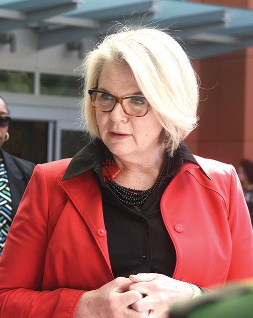 Margaret Spellings, former secretary of education and current president of the UNC System, speaks with Hannah Fennell, a junior studying applied mathematics, during her visit to North Carolina State University on April 20, 2016. Fennell was one of the students protesting Spellings appointment as president.