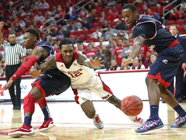 Cat Barber dives for the basketball during the 88-70 win over South Alabama in PNC Arena on Nov. 15.