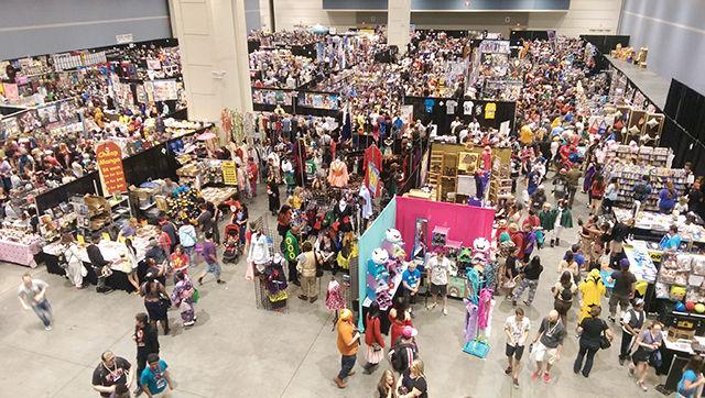 Vendors sell entertainment-themed merchandise in the Dealers' Room at Animazement held at the Raleigh Convention Center. Over 13,000 people attended the convention featuring performances, panels and cosplay.