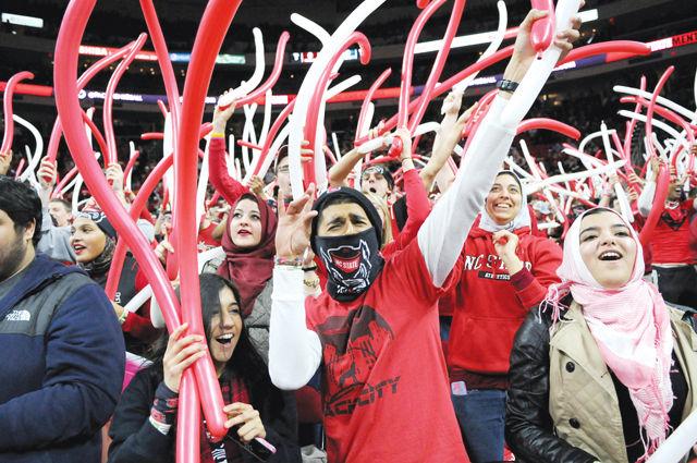 The NC State student section celebrates during the basketball game against UNC-Chapel Hill on Jan. 14, 2015. The Wolfpack lost, 81-79, to the Tar Heels at PNC Arena.&#160;