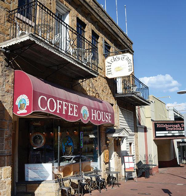 Mitch's Tavern is nestled above Global Village coffee shop on Hillsborough Street.&#160;