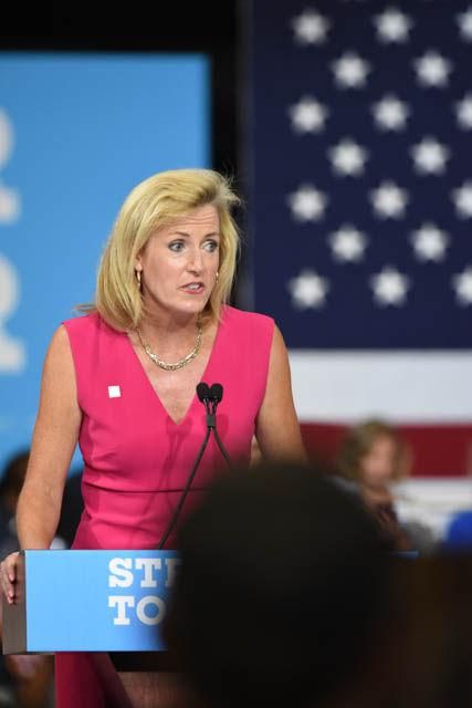 Caroline Sullivan, District 4 Wake County commissioner, speaks during a rally supporting presidential candidate Hillary Clinton in the North Carolina State Fairgrounds Exposition Center on Wednesday June 22. The rally also included guest speaker former North Carolina Gov. James Hunt and Chris Sgro, a member of the North Carolina House of Representatives.