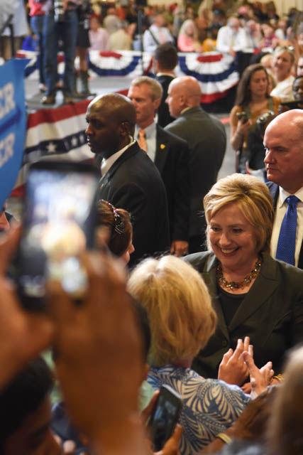 Hillary Clinton, presidential candidate, says farewells to rally attendees during a rally held in the North Carolina State Fairgrounds Exposition Center on Wednesday June 22. Clinton spoke on various topics including the current state of the economy.