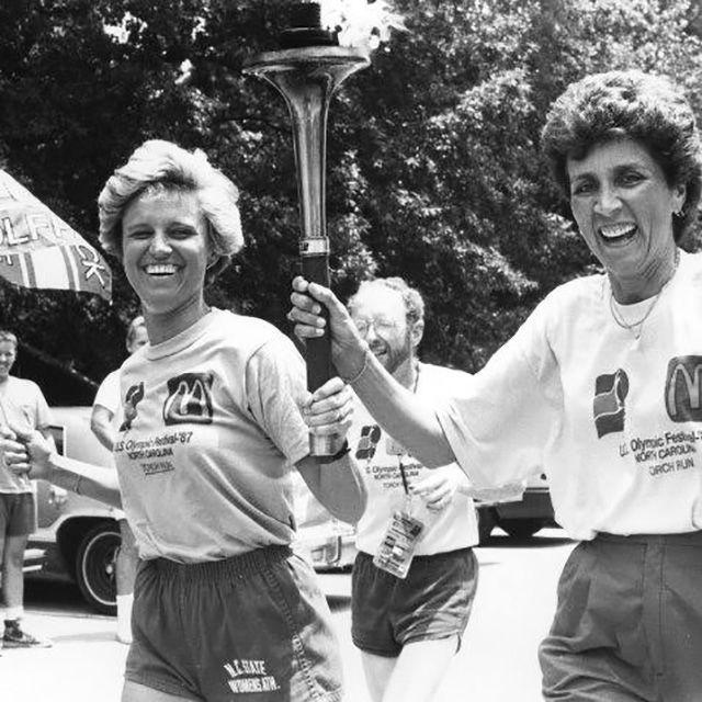 Kay Yow runs the torch through Raleigh in the opening ceremony of the 1987 U.S. Olympic Festival held before the 1988 Seoul Olympics. Yow coached the U.S. women&#8217;s basketball team to a gold medal victory.&#160;