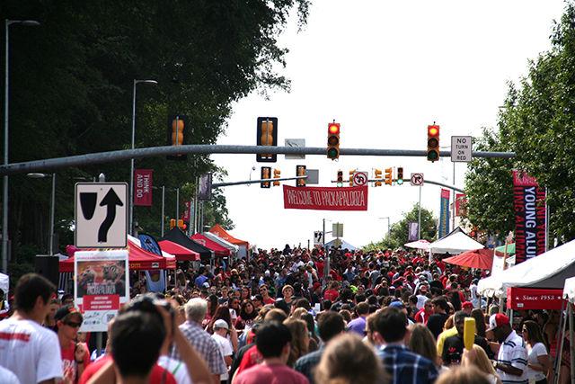 Thousands walk along Hillsborough Street for the fourth annual Packapalooza on Aug. 22, 2015.