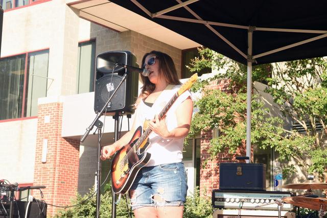 Guitarist Susan Plante from the band Faye sings at Concert on the Lawn on Aug. 15. Concert on the Lawn is hosted by WKNC radio in front of Witherspoon Student Center.
