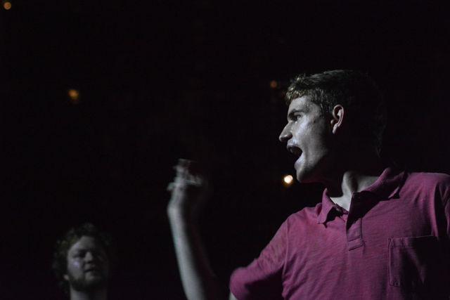 Anderson Burrus, a senior studying communication, raps during the sixth anniversary of NC State's Cypher at Free Expression Tunnel on Aug. 22. Burrus is one of the Cypher's master of meremonies.