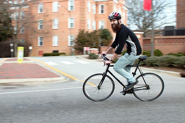 Brian Iezzi, a senior studying textile engineering, rides a bike that can be checked out through the Quad Bikes bike share program. Iezzi is the co-founder of Quad Bikes as well as the co-founder of Platinix, a startup that provides a replacement for platinum in the synthesis of hydrogen gas.