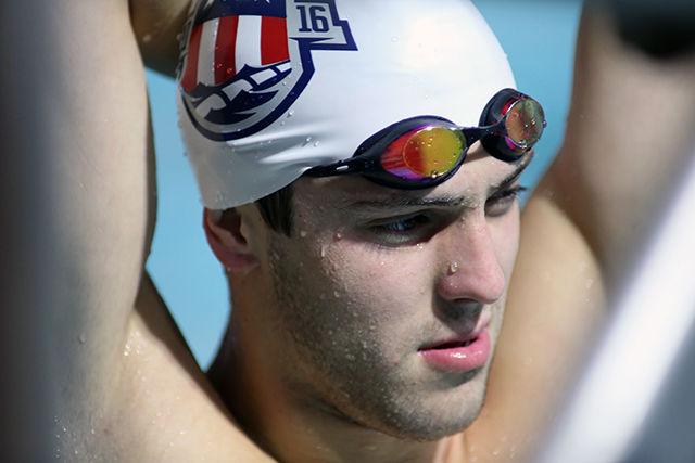 Ryan Held, a Junior on the swim team at NC State, takes a break during practice in the Carmichael Aquatic Center on July 7th, 2016. After being called a "no name swimmer" at the trials, Held commented on how he'd like to make a name for himself. "I think hopefully I can prove myself worth enough to be on that night relay and start making a name for myself. It's kind of hard to believe as a 21 year old that this is honestly just the start of my career. Most swimmers don't retire until 28 or 29 so I still have a few olympic games in me to train for. Hopefully." Held qualified for the men's 4x100 freestyle and will be joining in the relay with Michael Phelps.